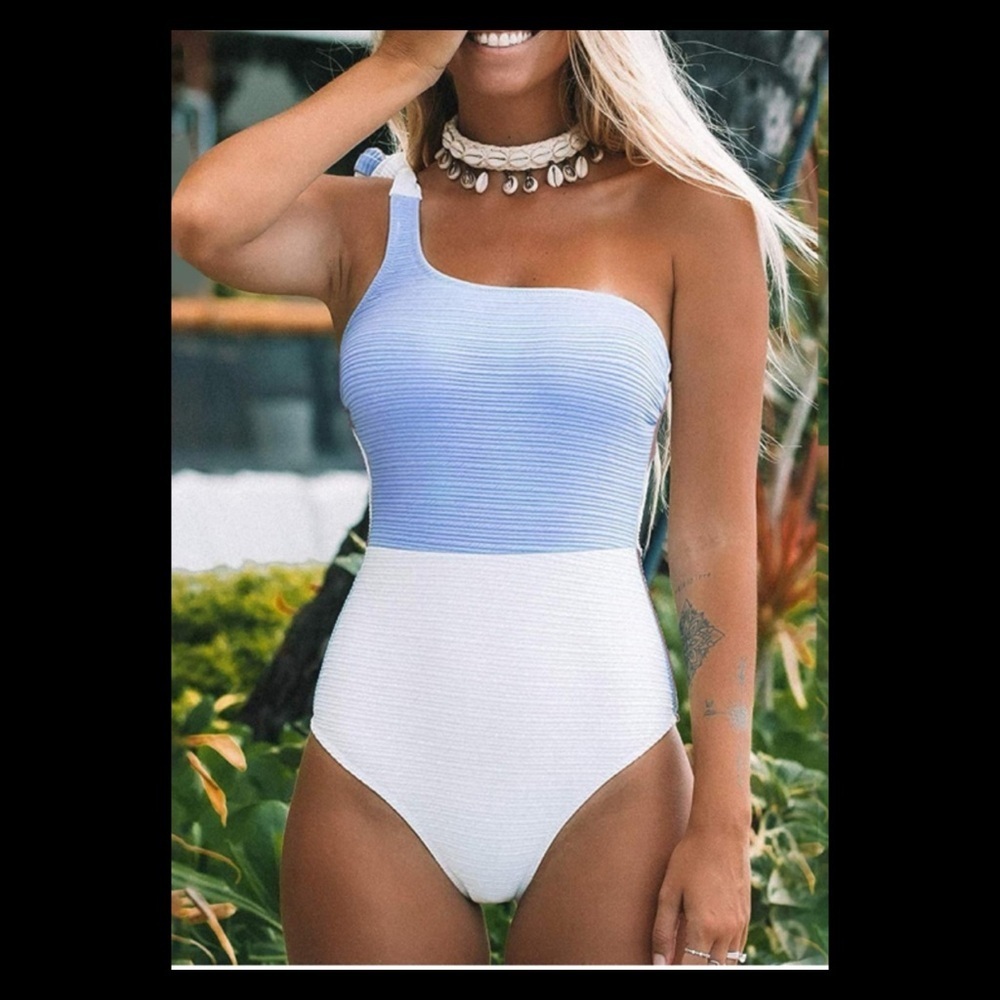 Power blue and white half sleeve one piece swimsuit.